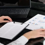 Research dossier for target company showing business research and company analysis documents